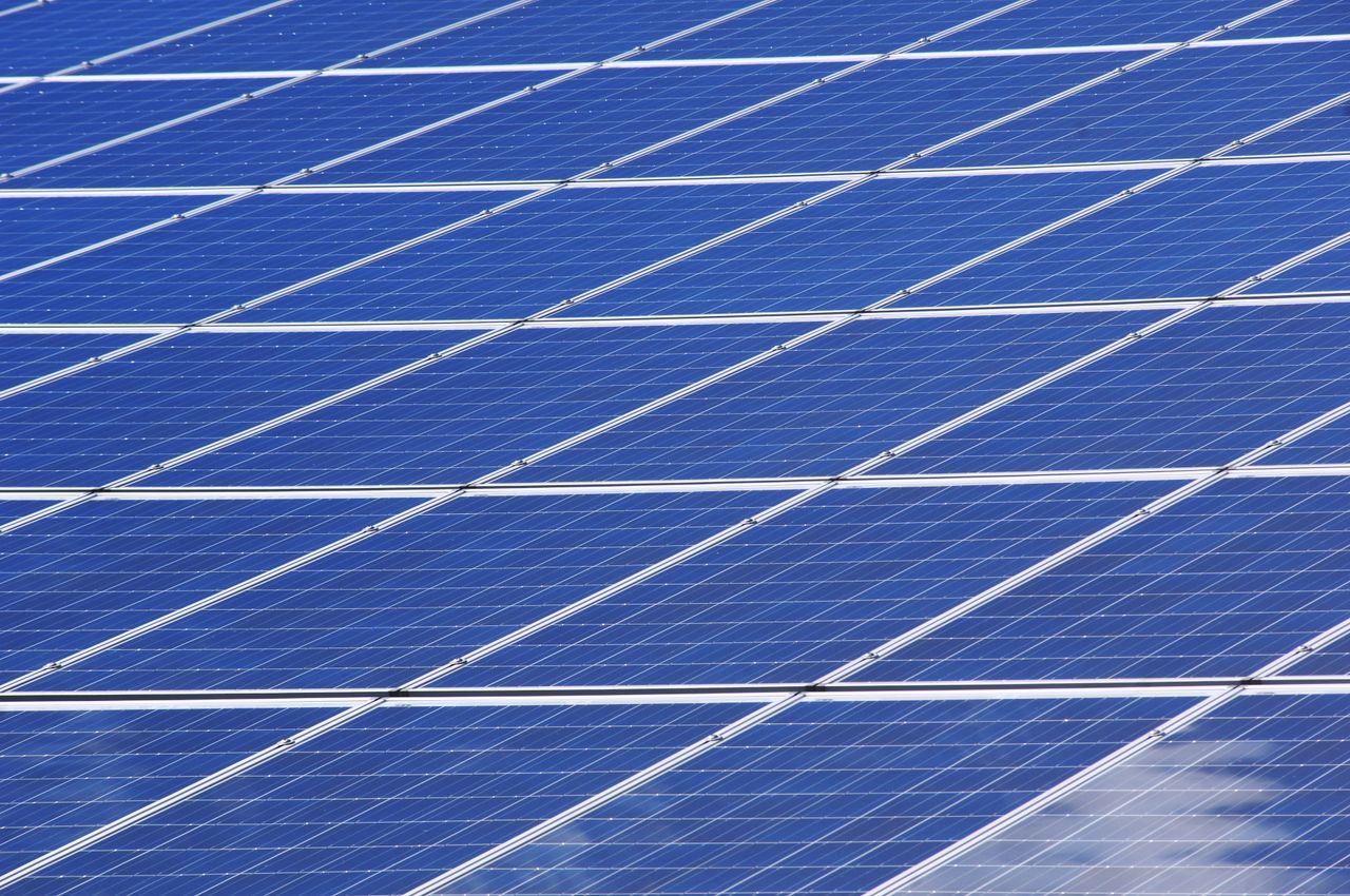 about-us-01 Close-up view of solar panels outdoors capturing renewable energy efficiently.